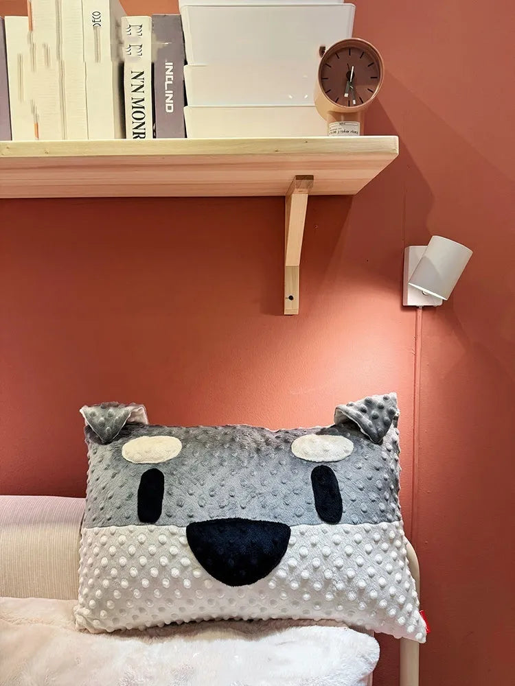 Grey Schnauzer print dog pillow on a sofa, measuring 50cm long.