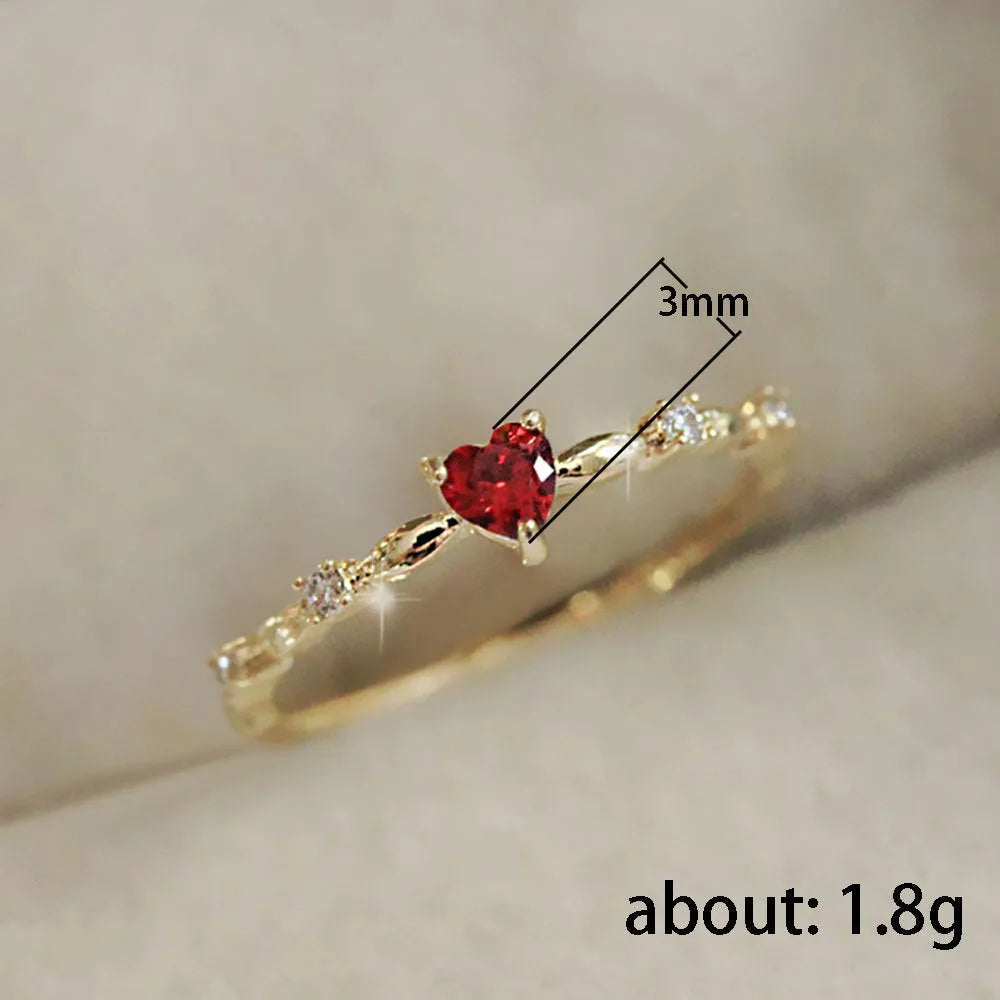 Geometric peach heart ring with zircon detail in gold or silver electroplated finish