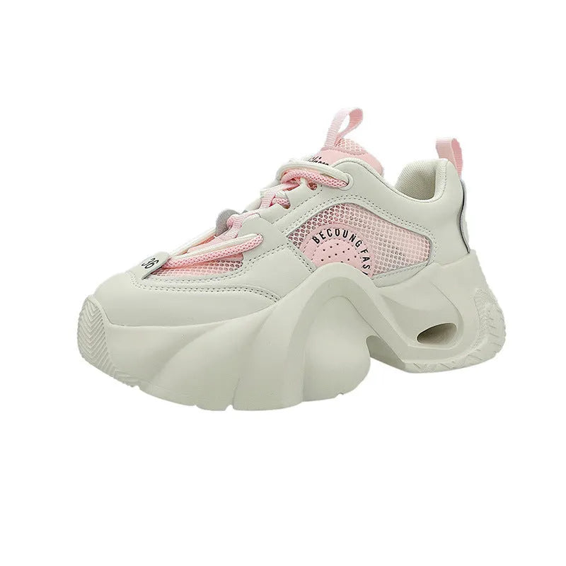Women's pink casual sneakers with thick sole and cross-shoulder straps on a white background
