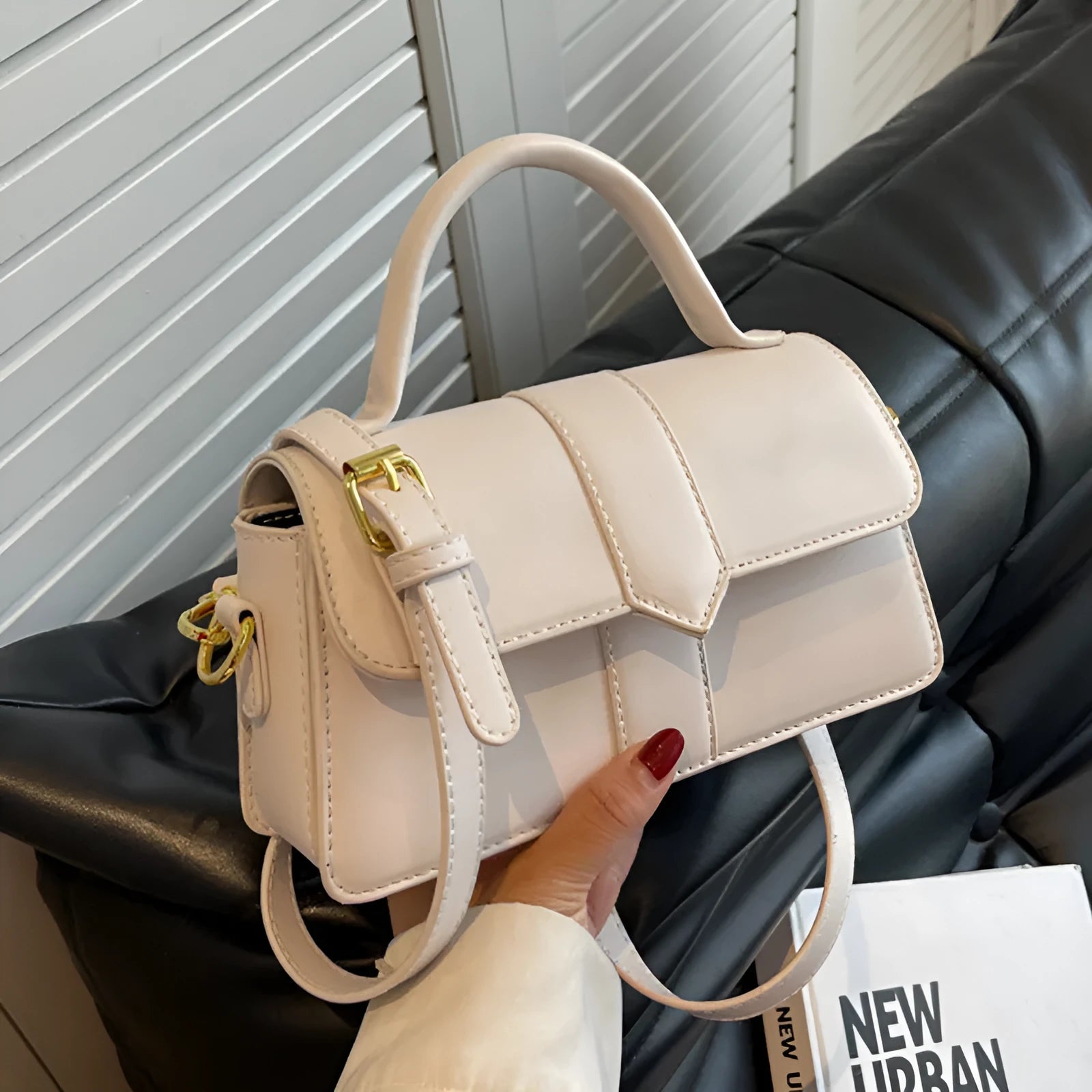 Beige PU leather women's messenger bag showing file compartment and sandwich pocket.