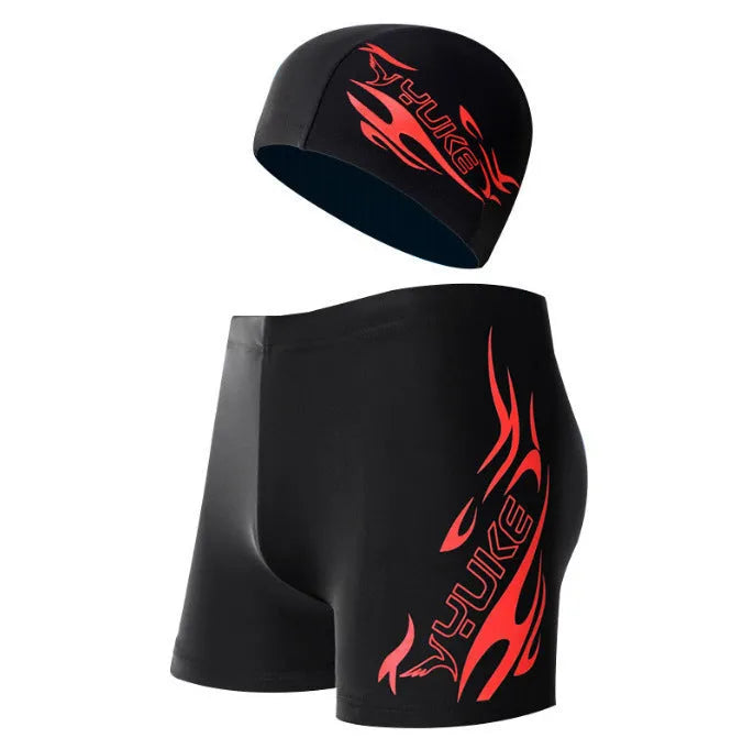 Men's boxer style swimming trunks with matching cap in blue fire design on black background