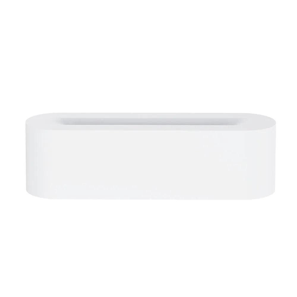 Black square USB aroma diffuser with colourful flame light effect and mist output on a wooden table.