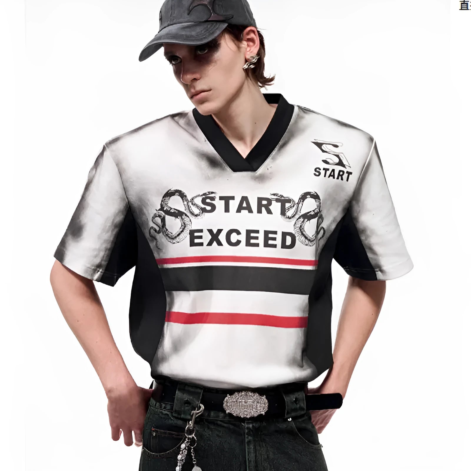 Women's V-neck short-sleeved top with a grey letter snake pattern print and padded shoulders.