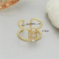 Copper open ring with 14K gold plating in H-12813 colour showing adjustable opening and asymmetric U-shape