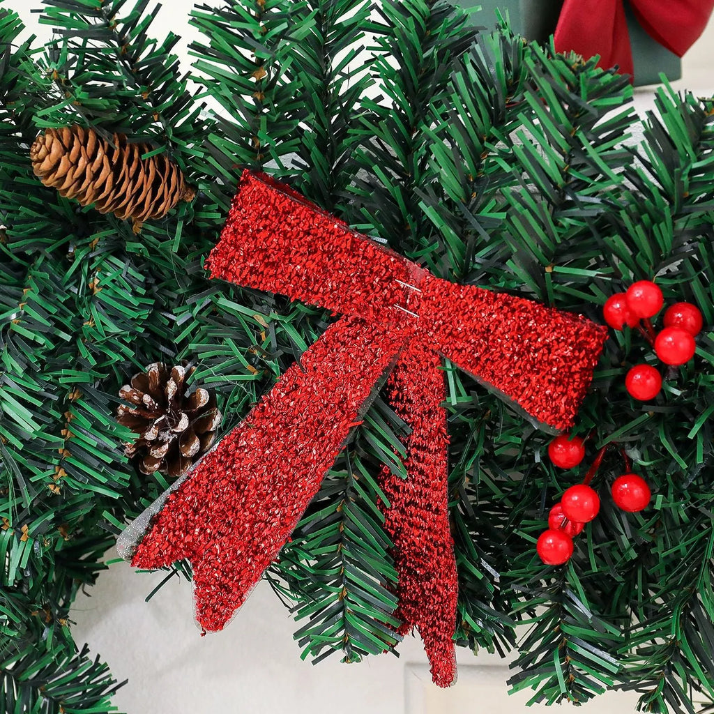 European-style rattan Christmas cane decoration with pine cone and red bow, approximately one metre tall.