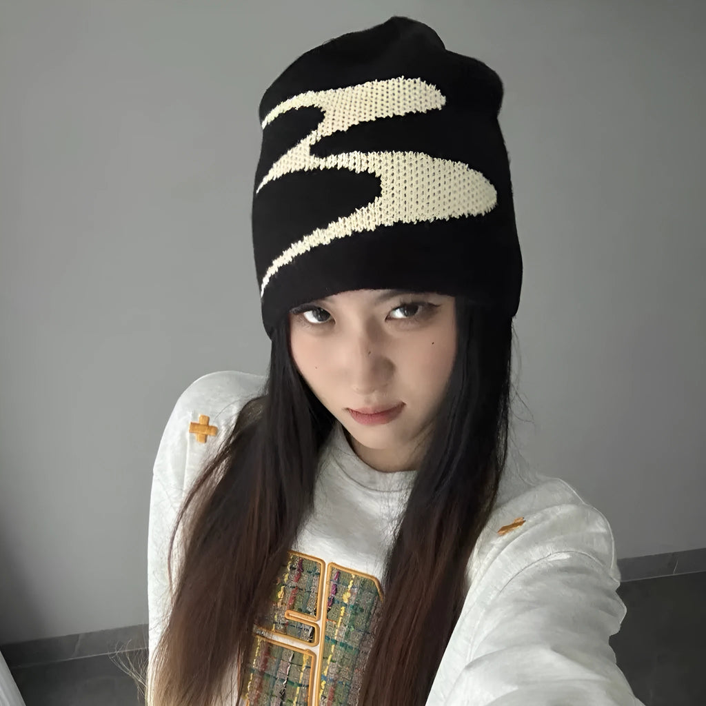 Knitted acrylic beanie hat in black, grey, or white for autumn and winter wear