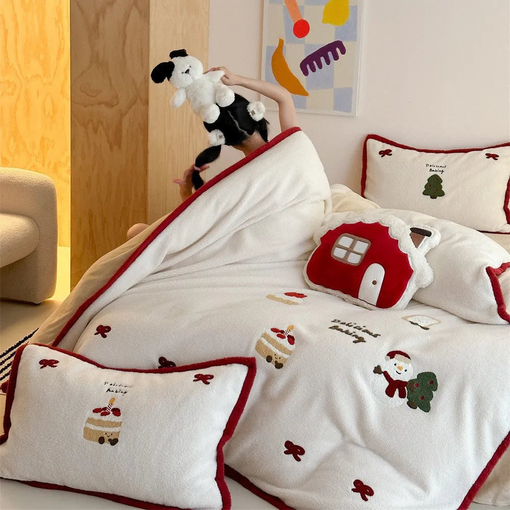 Cartoon winter Christmas themed polyester bedding four-piece set showing bed sheet, duvet cover, and pillowcases