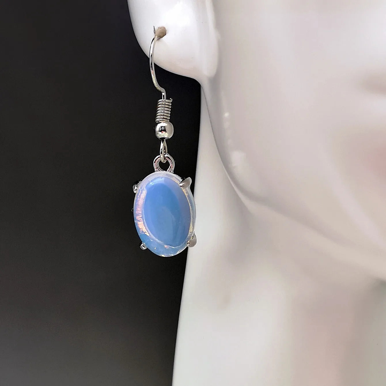 Moonlight white opal drop earrings with cross-shaped retro design and electroplated alloy finish