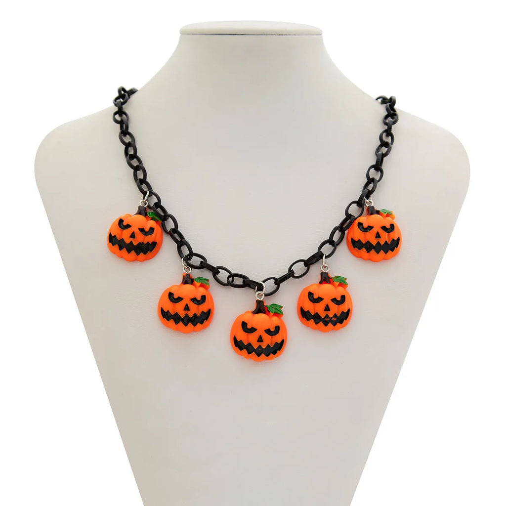 Colourful Halloween necklace showing a cartoon ghost pumpkin pendant on a chain.