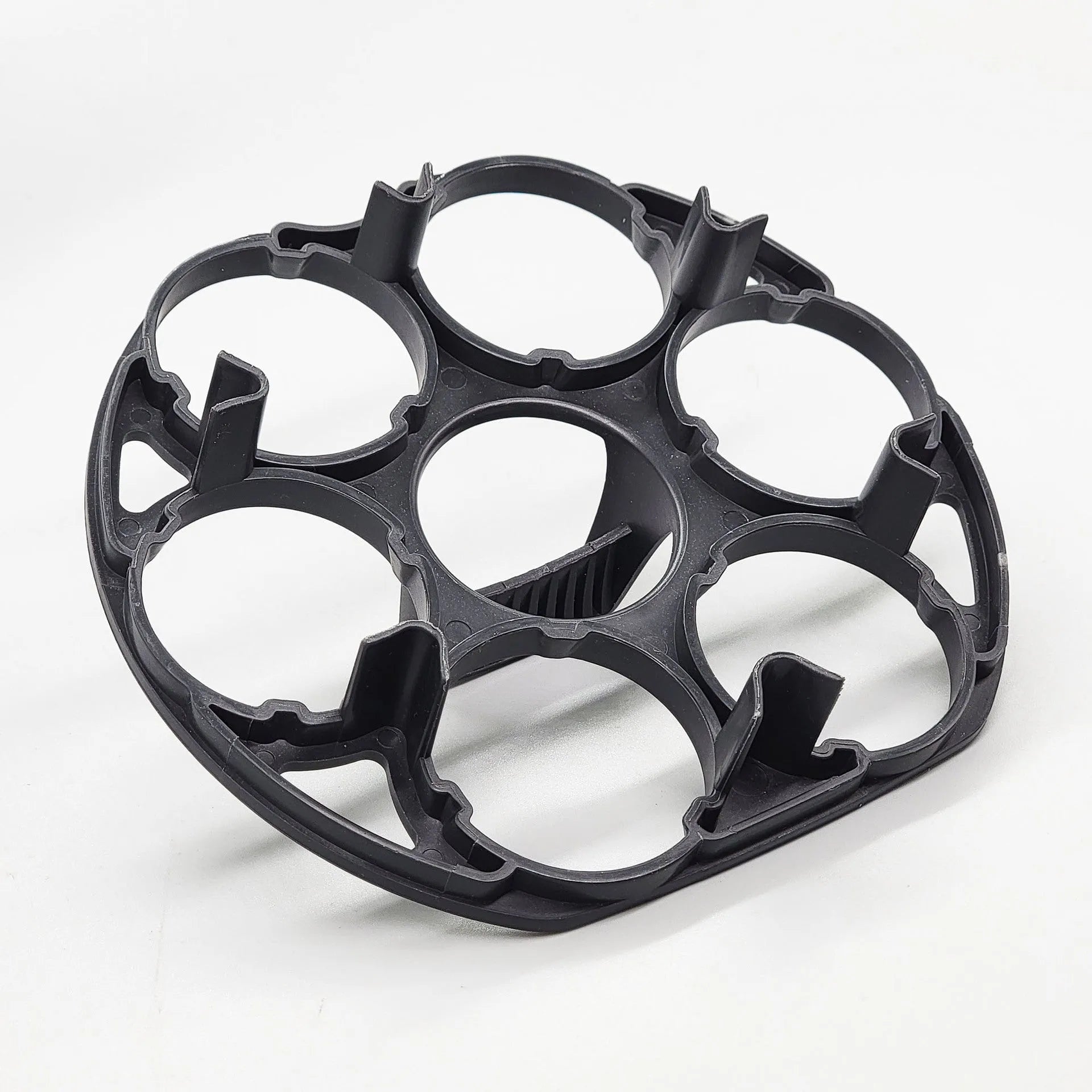 A black plastic egg holder rack for kitchen cooking machine storage, shown with dimensions.
