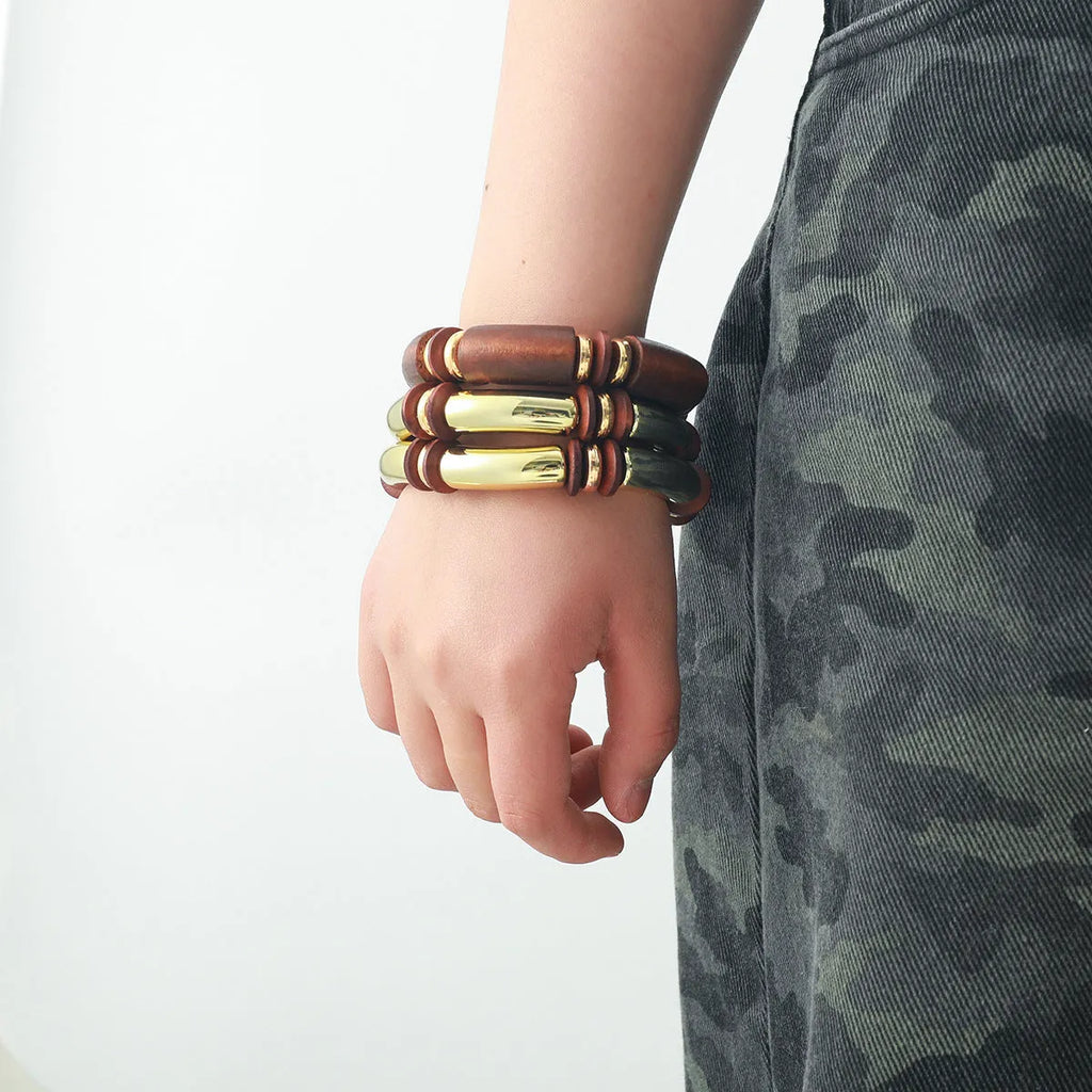 Alloy multi-layer necklace and bracelet set for women in silver tone with round details.