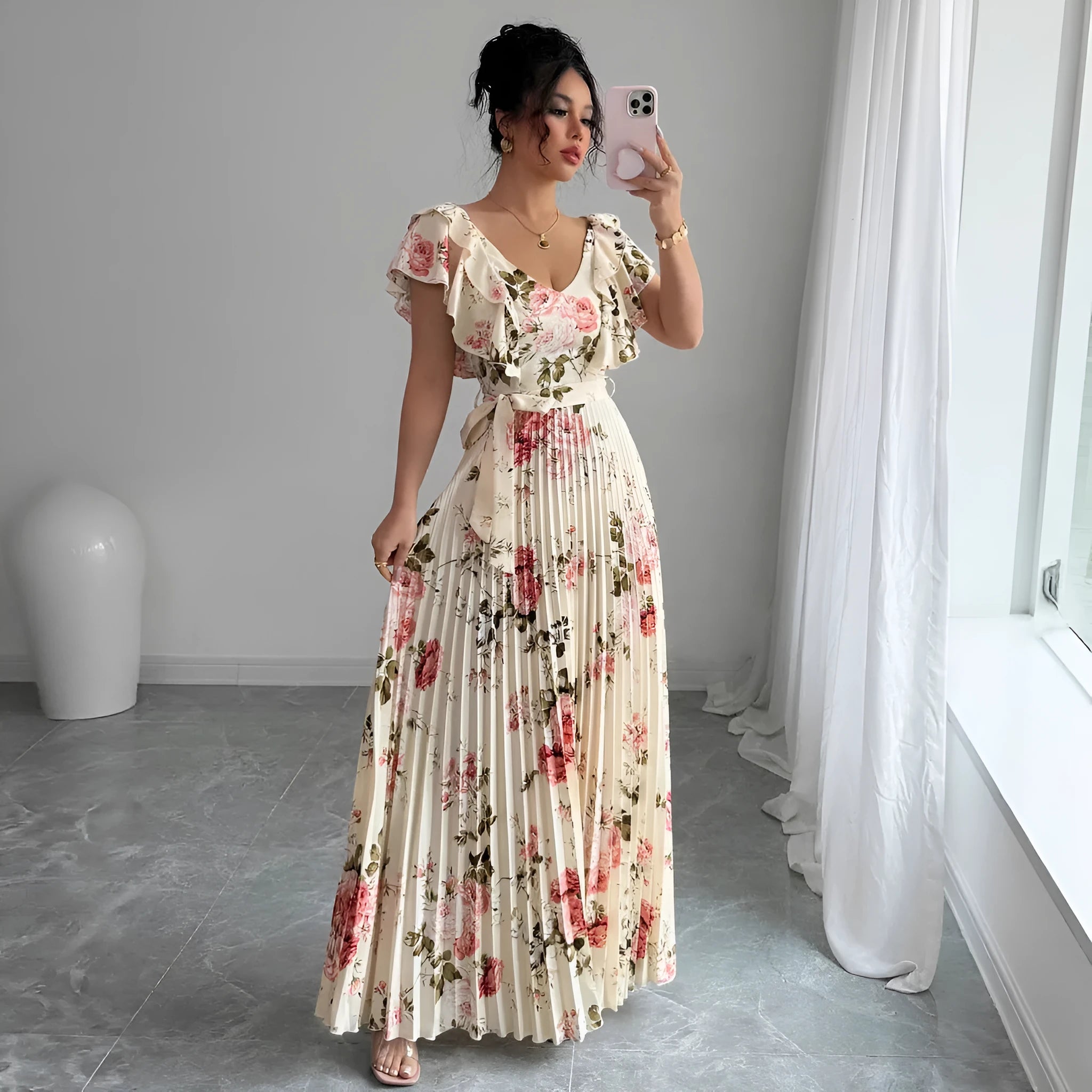 Apricot floral print V-neck dress with ruffled sleeves and a voluminous high-waisted swing skirt.