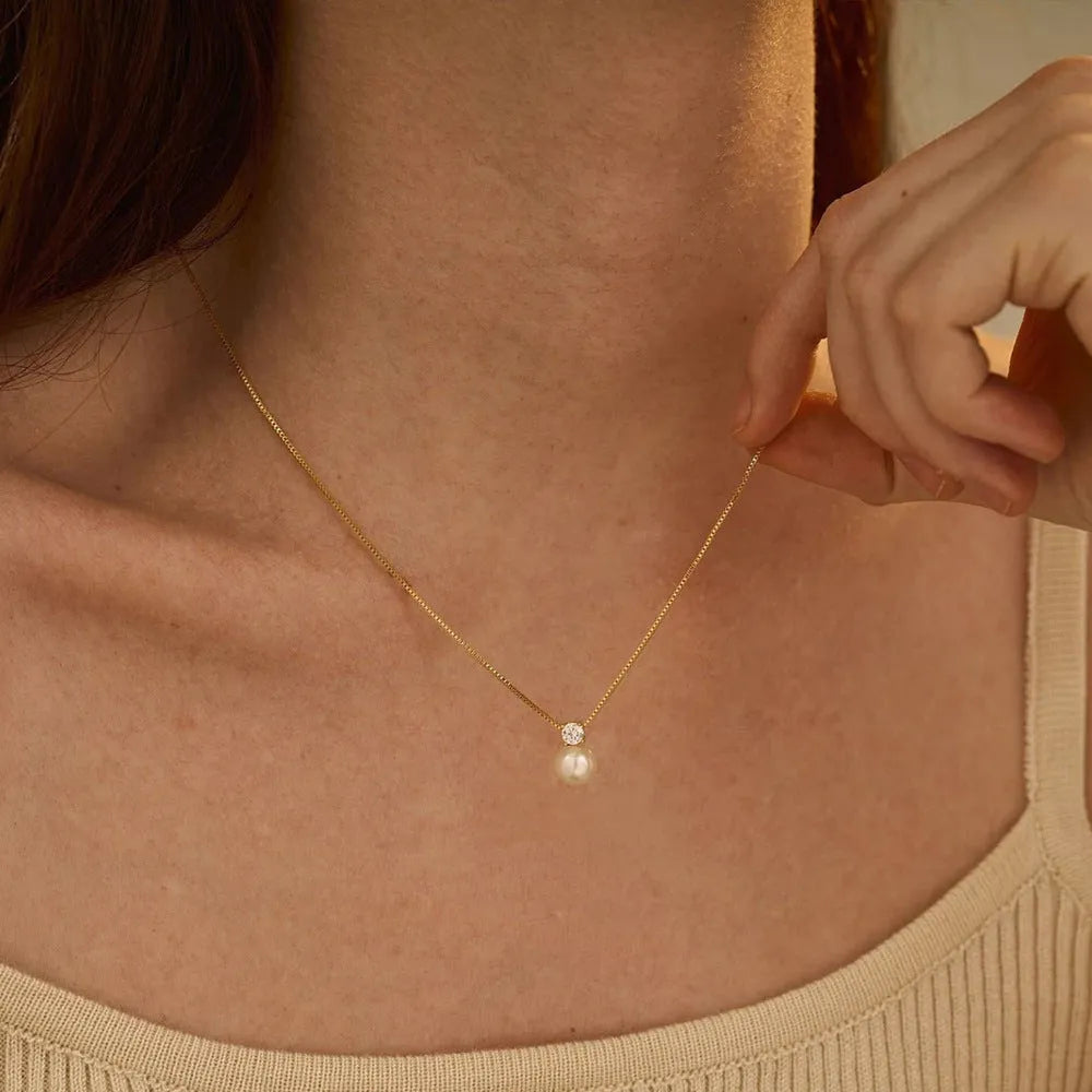 Women's stainless steel necklace with imitation pearl and zircon pendant in gold or steel colour