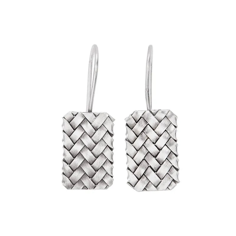Sterling silver rectangular drop earrings with a woven diamond plaid geometric pattern.
