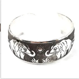 Carved Miao silver bracelet with openwork floral patterns in adjustable Roman shape