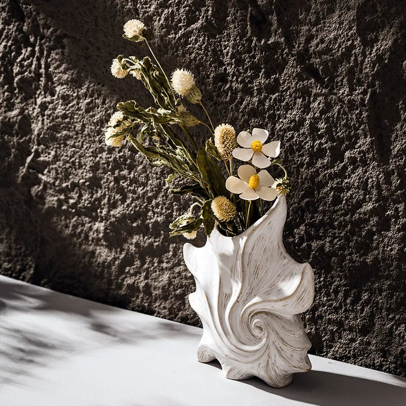 French art ceramic vase with coloured glaze in European retro style on wooden table