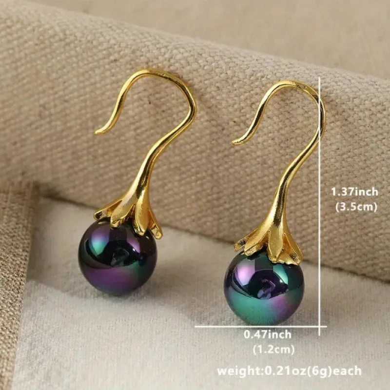 Women's retro fashion earrings with electroplated gold finish and alloy construction
