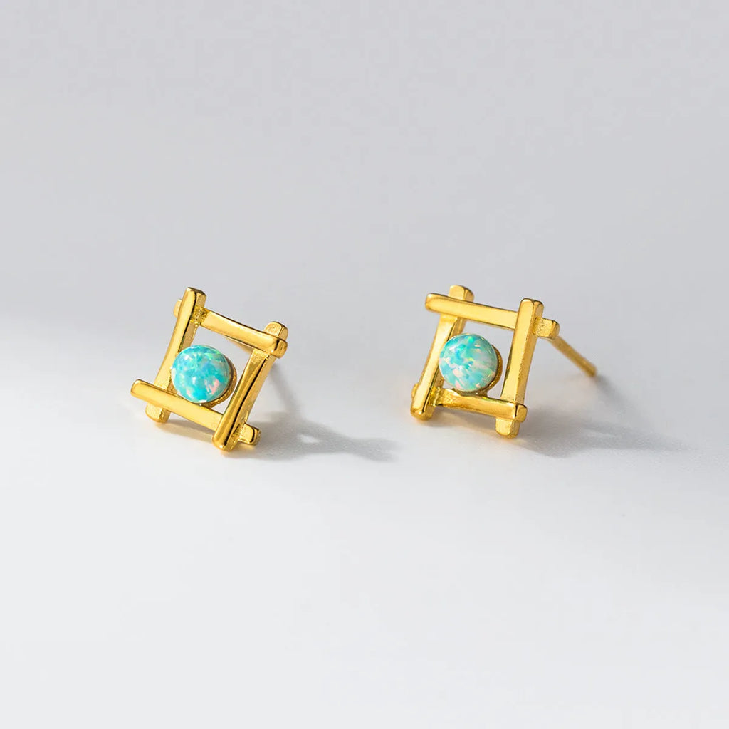 Geometric cross quadrangle sterling silver 925 stud earrings for women in gold and silver finishes.