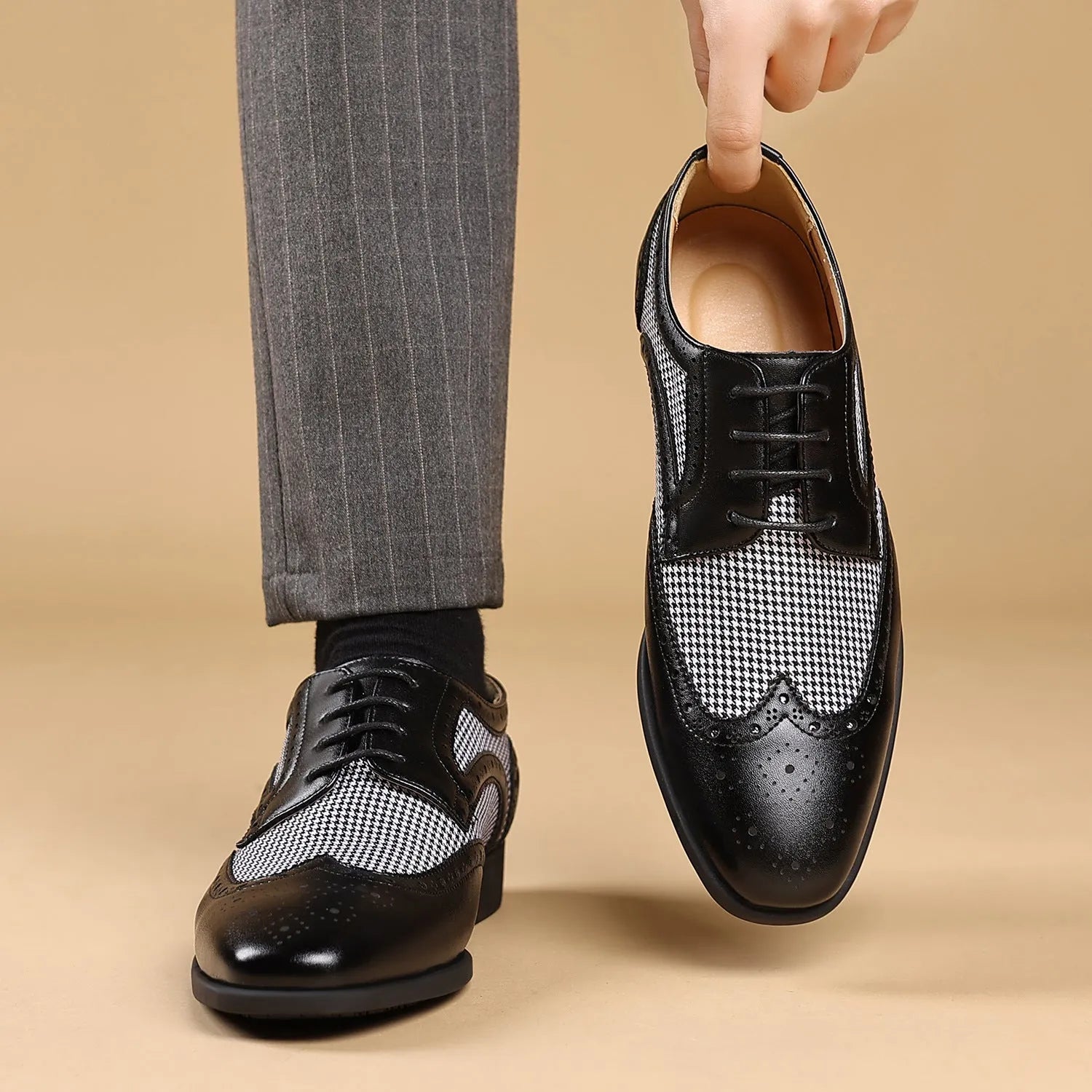 Men's houndstooth plaid casual shoes in black with a square toe and rubber sole.