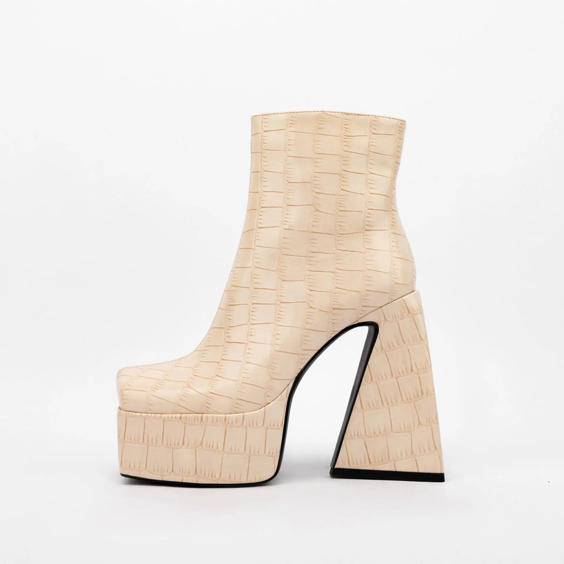 Women's ankle boot with a super high heel in a solid beige colour, made from artificial PU material.