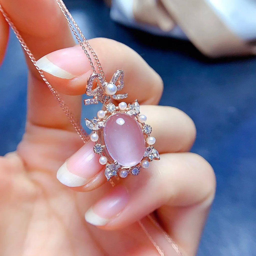 Geometric rose quartz pendant necklace with silver chain and rose gold plating
