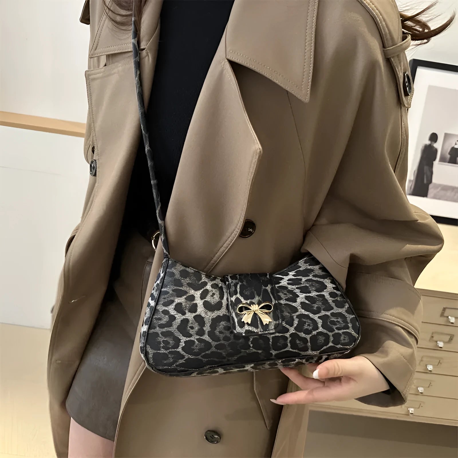 Casual large capacity PU handbag for women in black, shown with outer sandwich pocket.