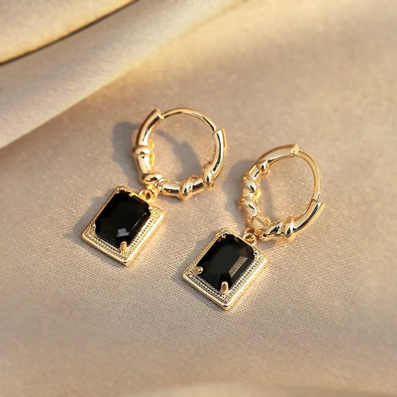 Copper earrings with geometric quadrilateral shape and black zircon stones in French Court retro style