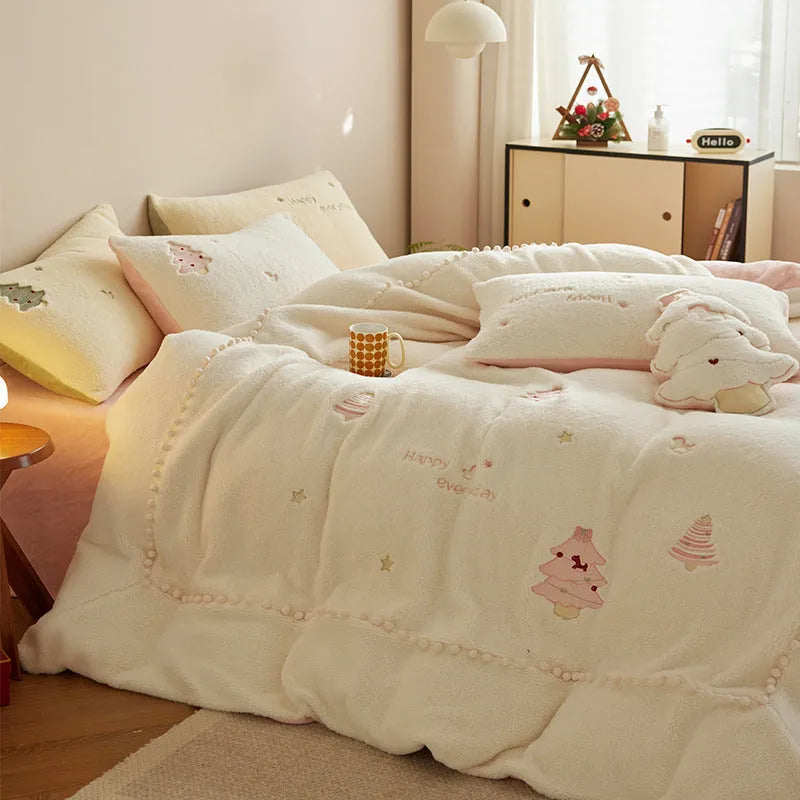 Milk fibre four-piece bedding set with green Christmas tree pattern on bed