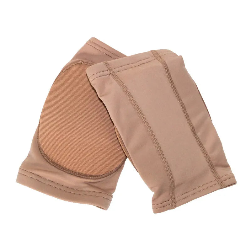 A pair of black ballet and dance knee pads for yoga exercise, shown alongside a skin colour pair.
