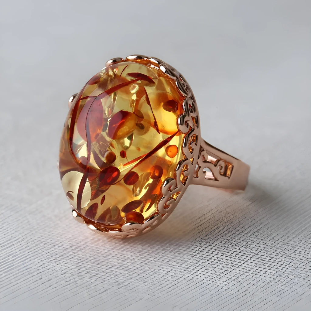 Women's beeswax amber ring in New Amber Type A colour with retro ethnic styling and alloy base