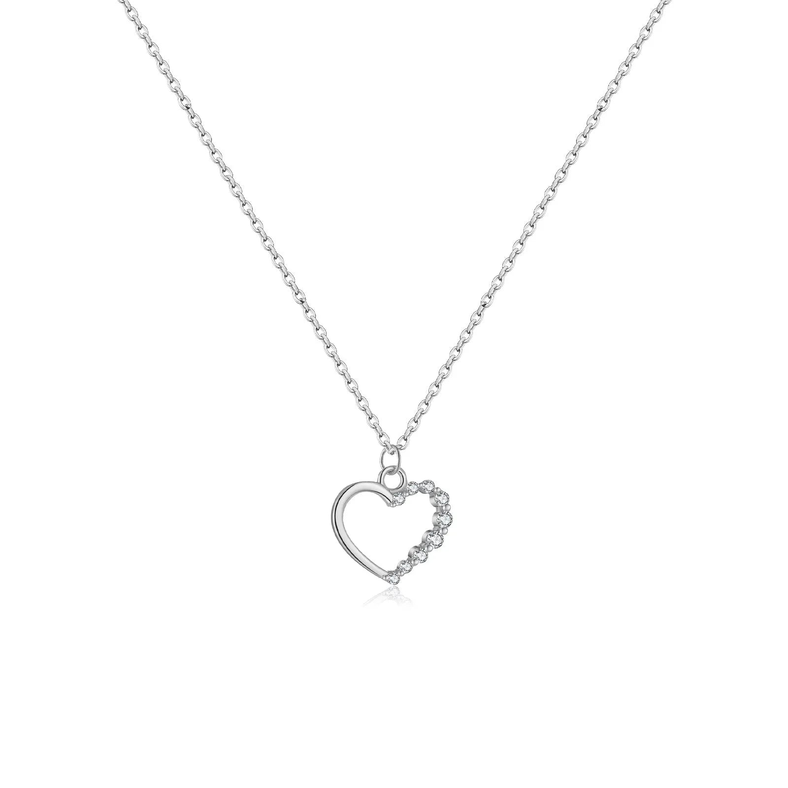 Sterling silver hollow heart pendant necklace on a regular chain, available in white gold or platinum plating.