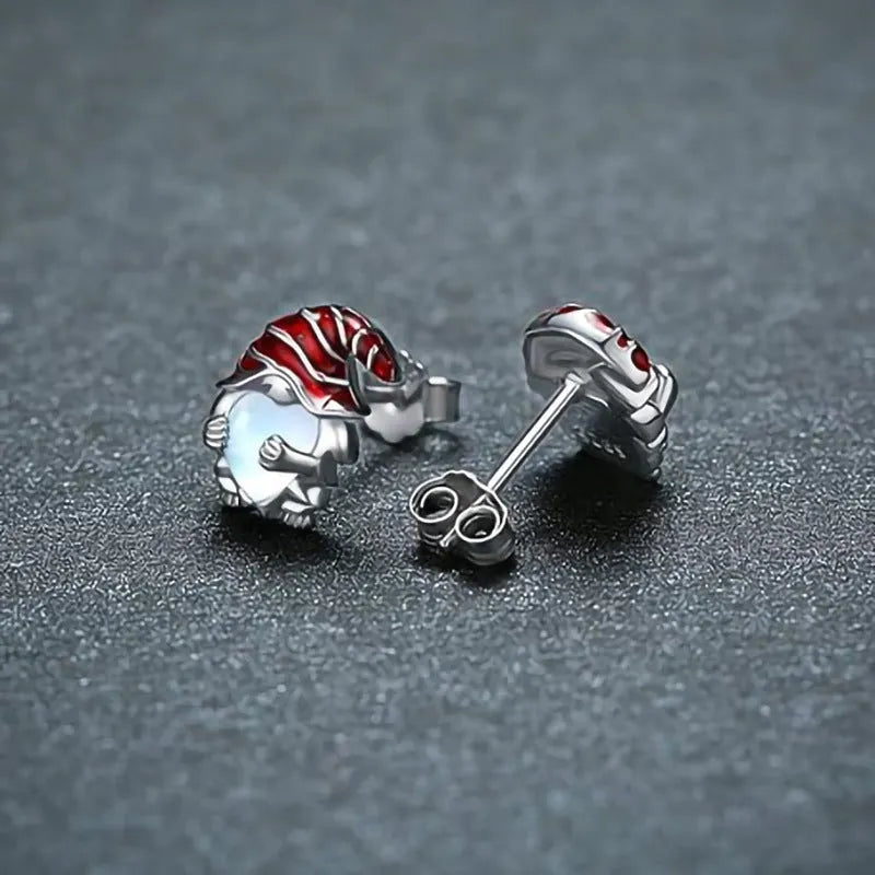 A pair of women's Santa Claus fashion earrings with a heart shape in an electroplated white gold colour.
