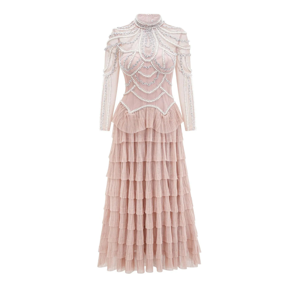 Women's long sleeve black dress with beaded decoration and a full-length skirt.