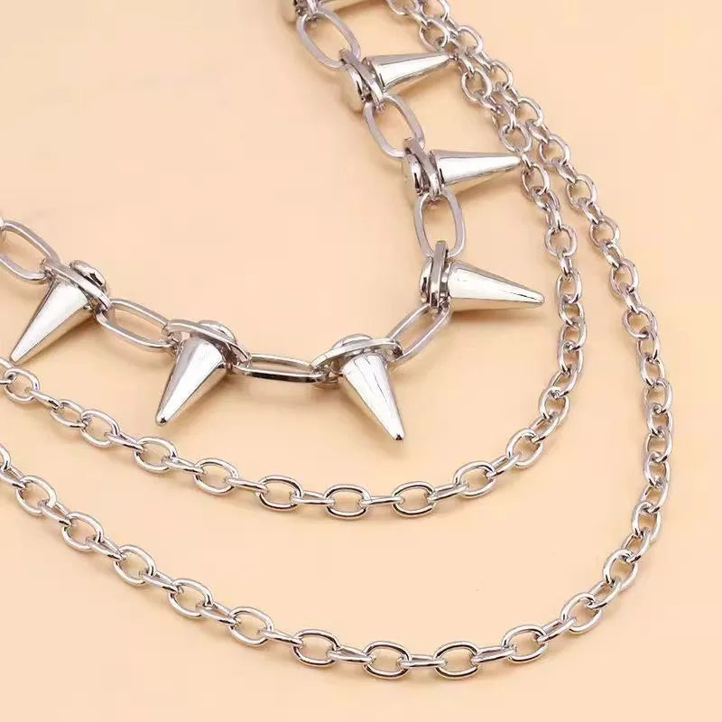 Silver metal waist chain with punk rivets and zipper decoration measuring 115cm length