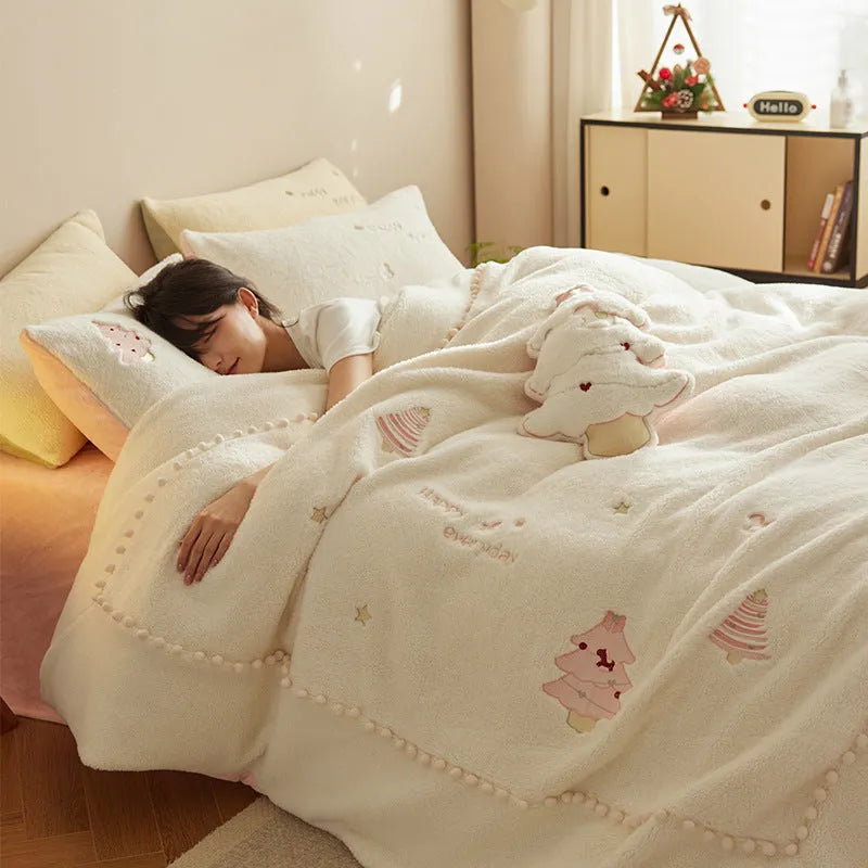 Milk fibre four-piece bedding set with green Christmas tree pattern on bed