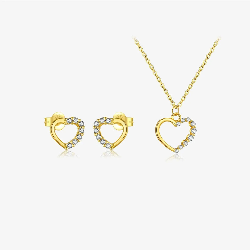 Sterling silver hollow heart pendant necklace on a regular chain, available in white gold or platinum plating.
