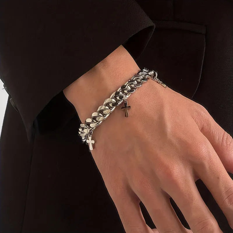 Men's titanium steel bracelet showing geometric cross design on a wrist.