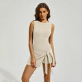 Women's solid colour sports skirt with built-in shorts for tennis and workouts in nylon fabric.