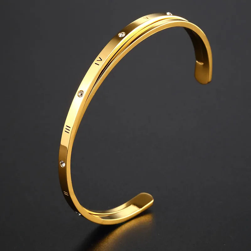 Stainless steel open-ended bracelet with zircon inlay in gold, rose, or steel colour options