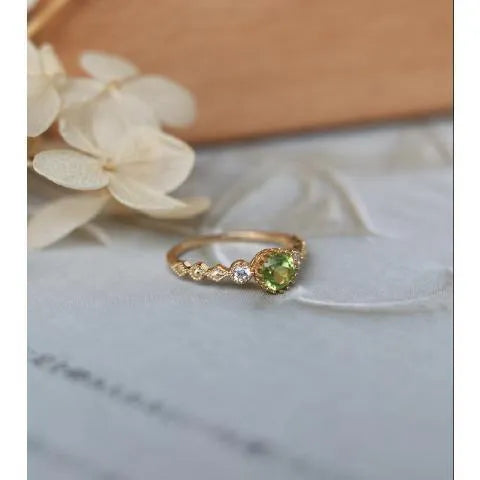 Geometric copper art ring with green imitation peridot finish in retro Japanese style.