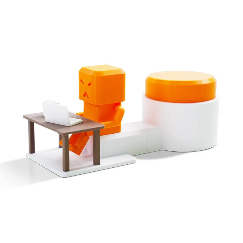 Orange plastic vent decompression table turning toy measuring 16cm wide