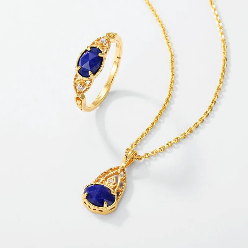 Silver alloy geometric oval ring with lapis lazuli blue stone and round decorative elements