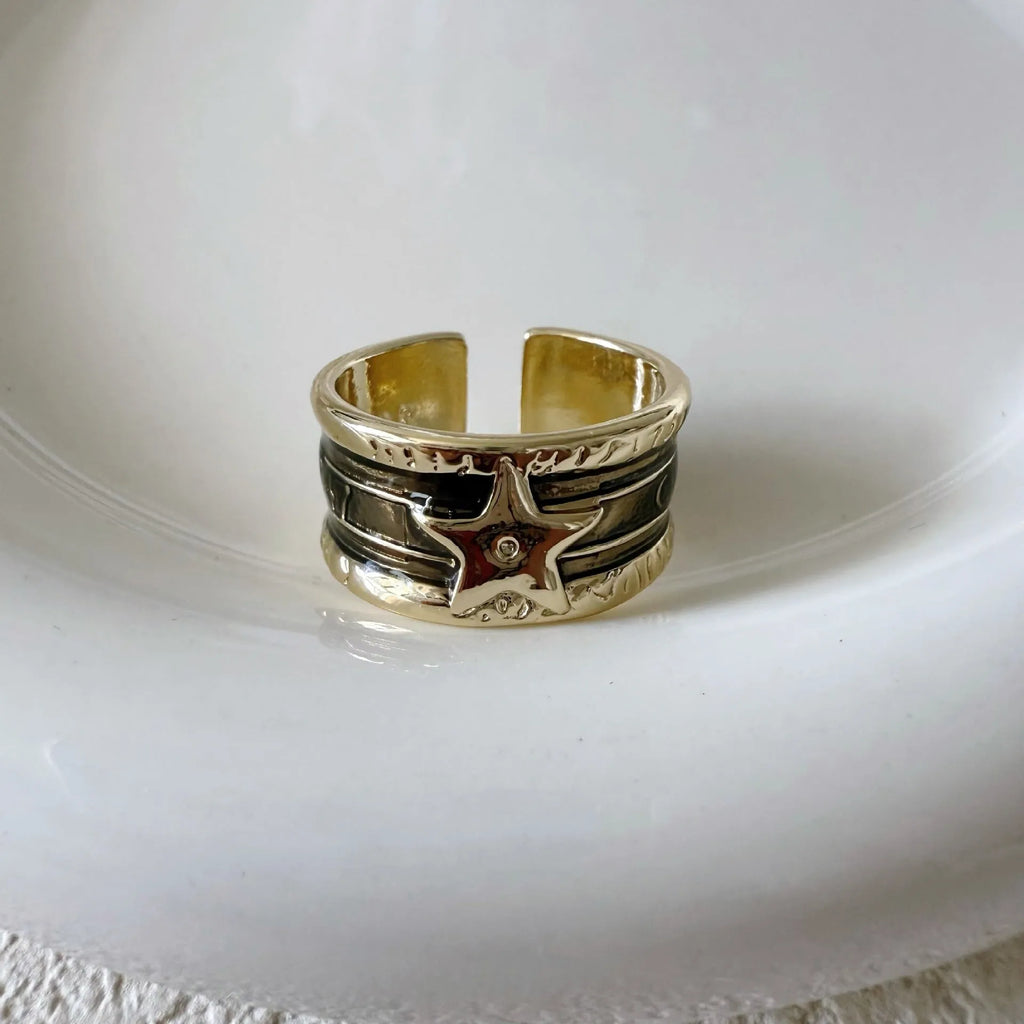 Adjustable geometric copper ring with distressed electroplated finish in multiple colour options