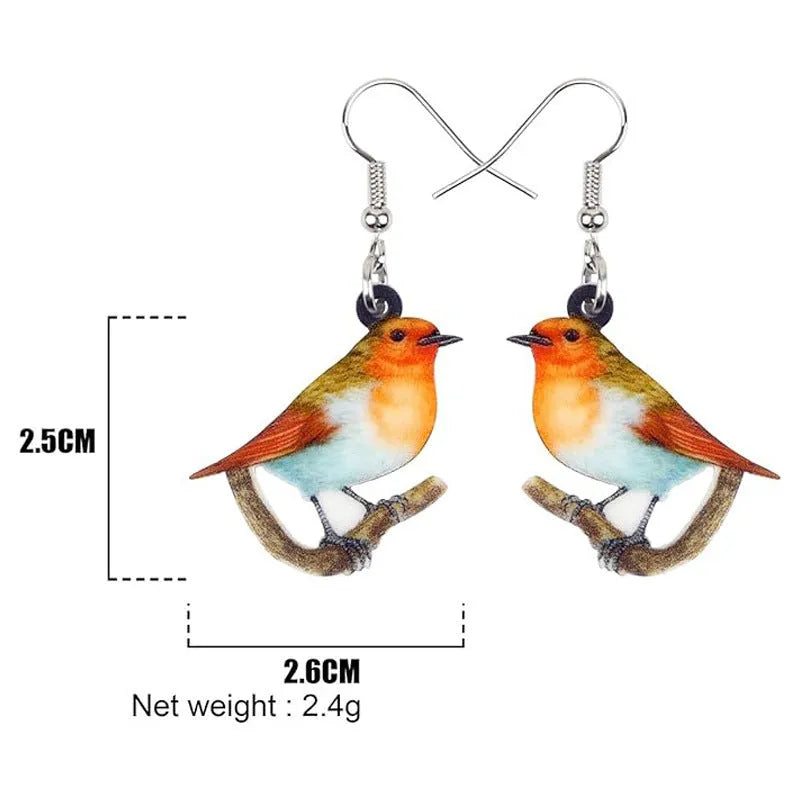 Acrylic blue titmouse pendant earrings with geometric animal zodiac design and printed snake pattern