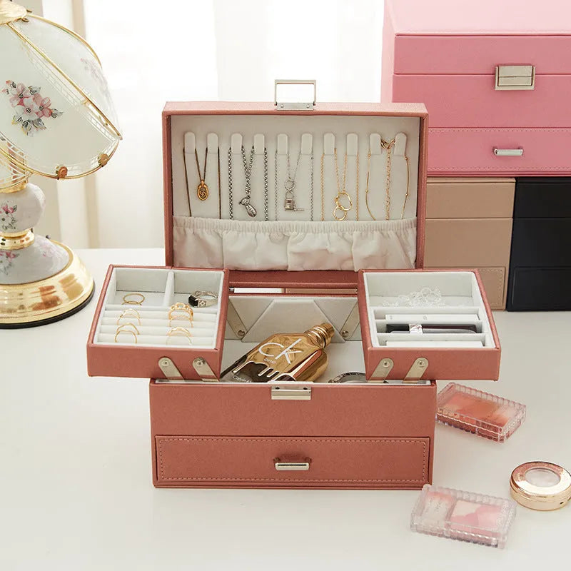 PU leather jewellery storage box in beige with hard case construction measuring 22.5cm