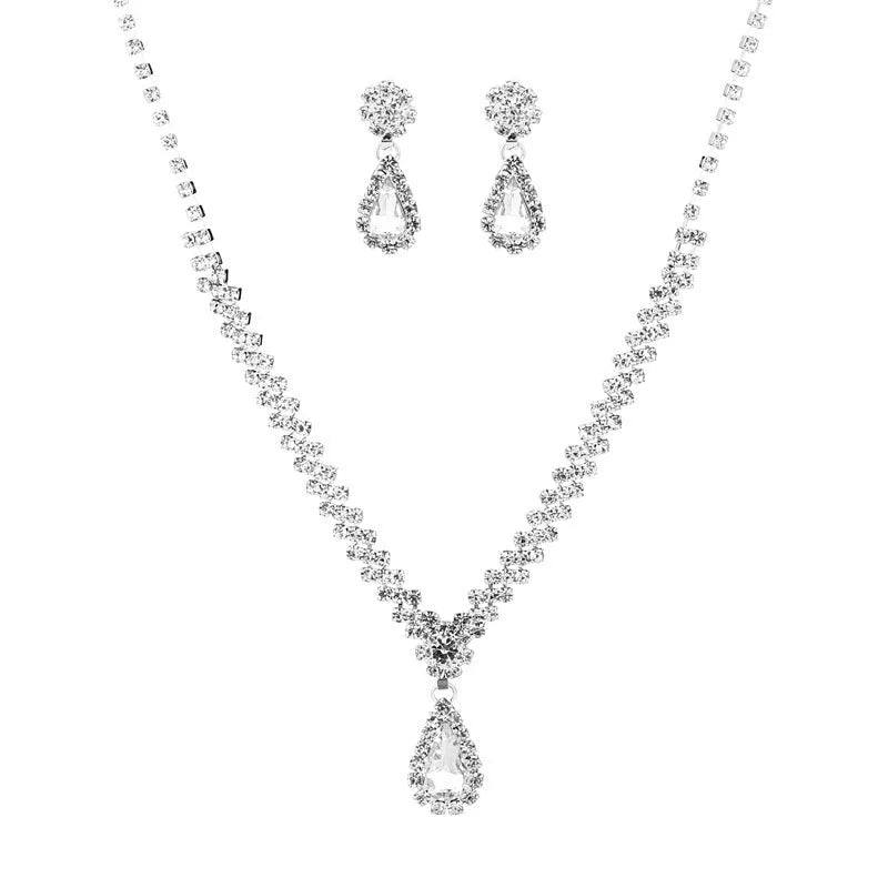 Claw chain necklace and earrings set with drop-shaped rhinestones in multiple colour options