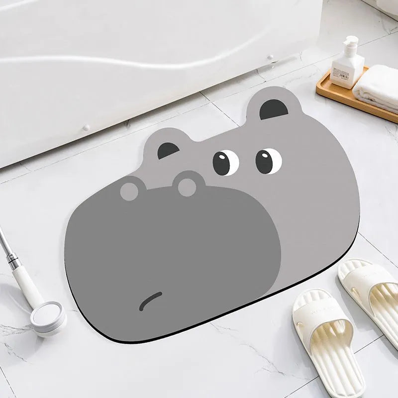 Diatomaceous earth bathroom mat with animal cartoon design in shower setting