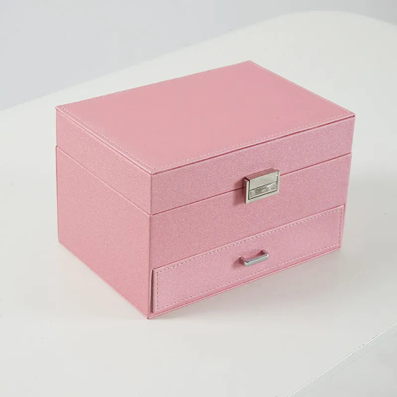 PU leather jewellery storage box in beige with hard case construction measuring 22.5cm