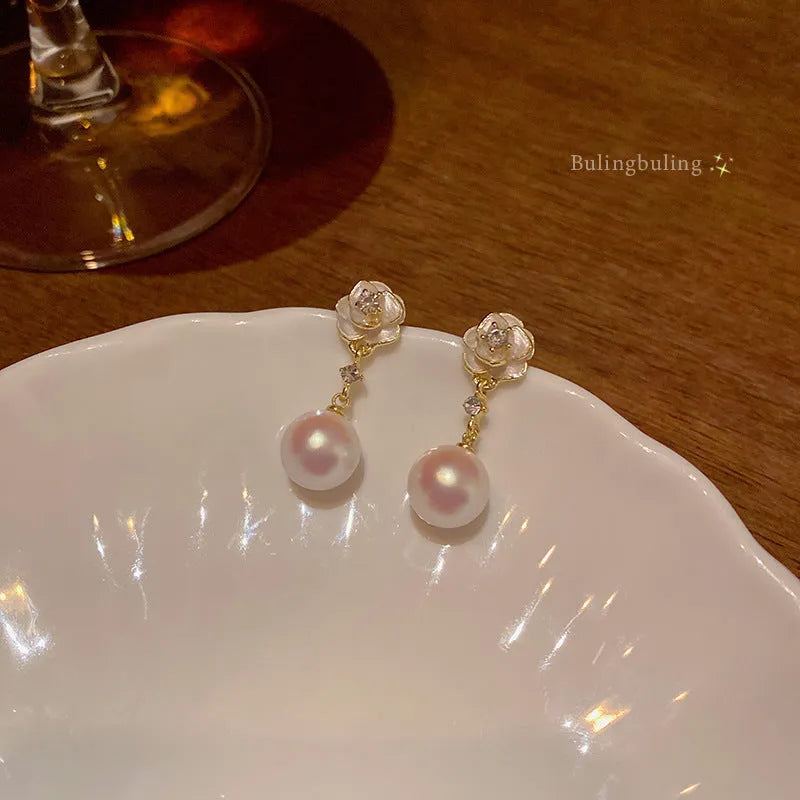 Camellia flower stud earrings for women with detailed floral design and alloy construction