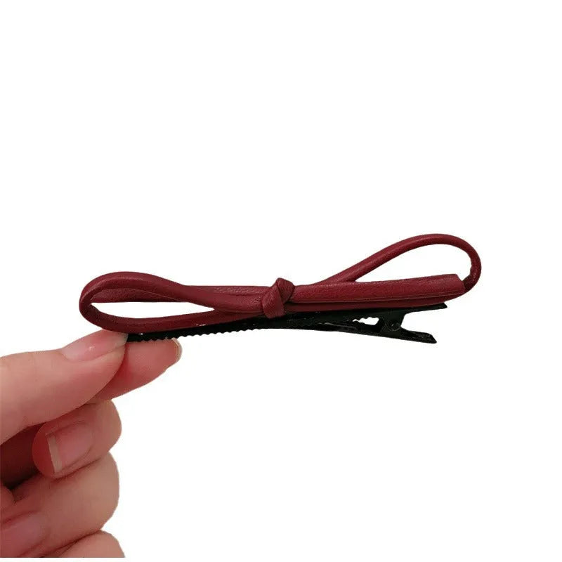 Wine red leather bow hair barrettes with handmade construction